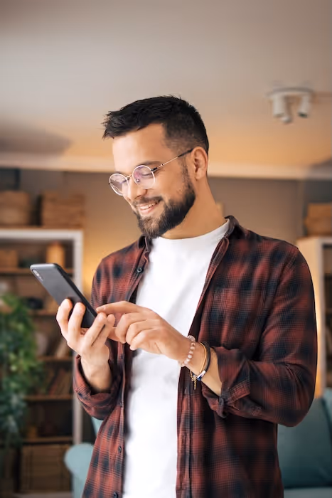 A smiling Crew customer at home